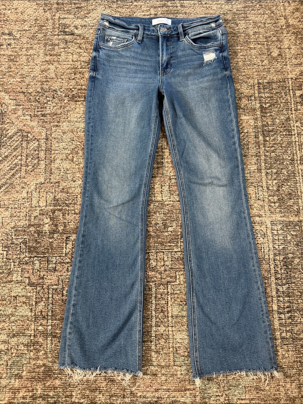 High-Rise Blue Flare Jeans with Raw Hem Size 28